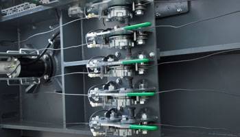 Umreifung des Ballens in der gewünschten Länge